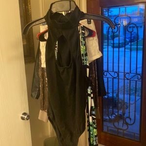 Black turtle neck body suit